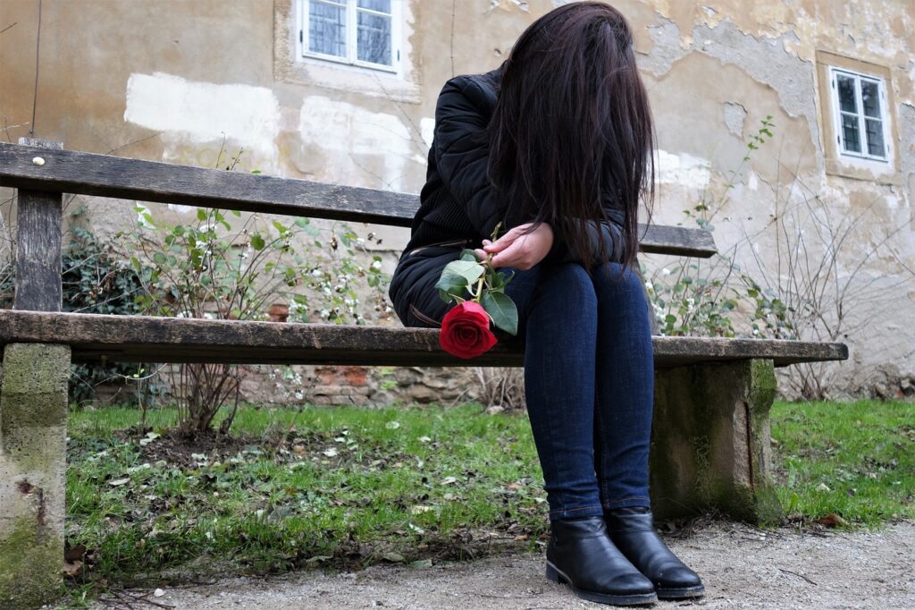 sad girl, red rose, lonely-3007318.jpg
